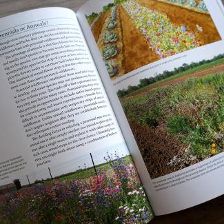 Open book about farming with beneficial insects